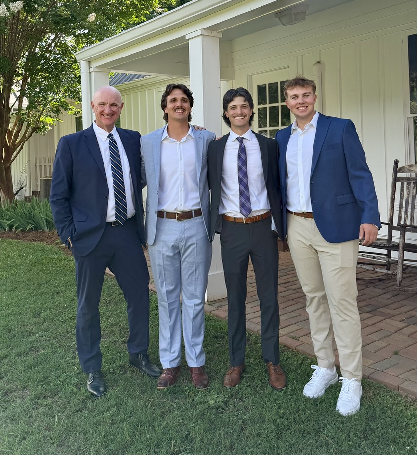 Eric and Charlie and the two brothers - Hudsie and Jackson at Jackson’s wedding.